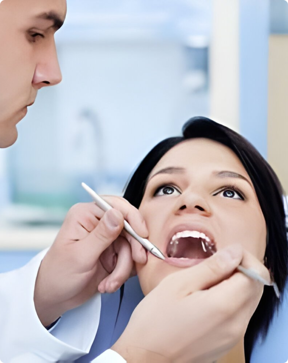 Image d'un dentiste réparant une dent cariée