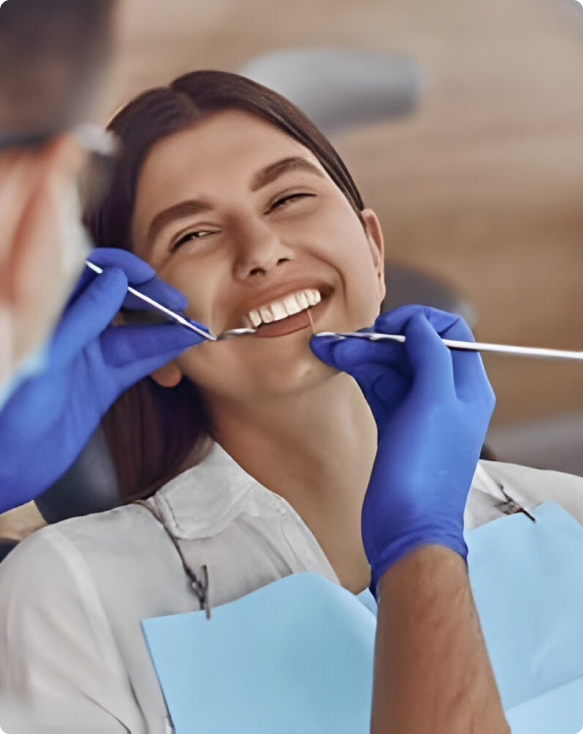 Photo de dents restaurées et en bonne santé après un soin dentaire
